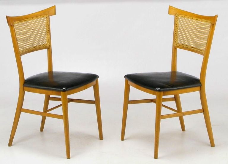 Paul McCobb Perimeter Group maple and cane dining chairs with black vinyl seats. Soft Asian influence with pagoda-form chair back. Original in every way.