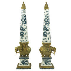 Vintage Brass Elephant-Mounted Porcelain Obelisks Inspired by Gian Lorenzo Bernini