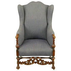 Italian Regency Upholstered Wing Chair with Carved Wood Frame
