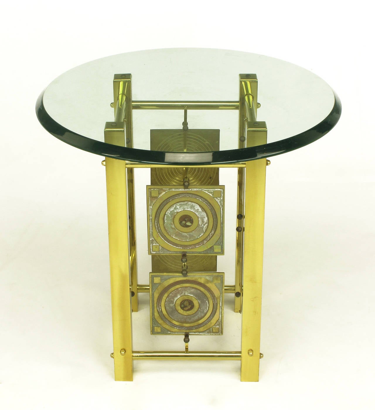 One of a kind artist studio Postmodern brass and enameled brass panel side table with glass top. Each panel was cast and enameled then suspended two to a side with brass bars and clips with brass ball detail. Similar in style to the acid etched