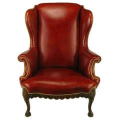 Circa 1940s Red Leather & Carved Walnut Wing Chair