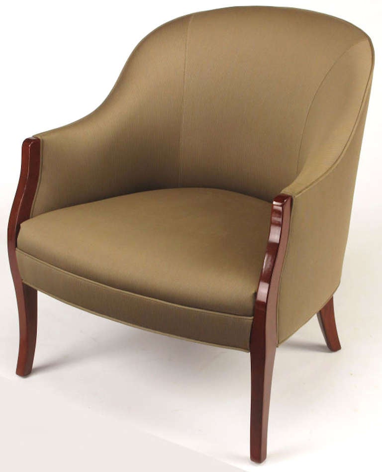 Barrel back arm chair designed by Bennett protege and model maker Timothy Defiebre for Brickel Associates Inc. The Emile lounge chair, named after renowned French designer Jacques-Emile Ruhlmann features exposed mahogany front and back saber style