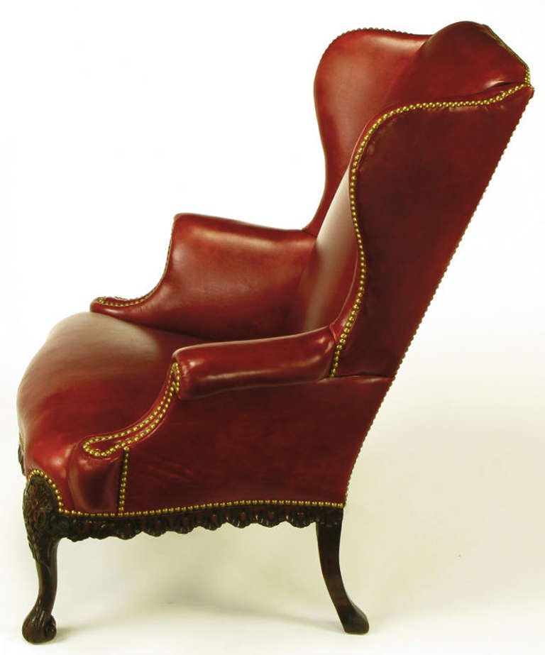 Circa 1940s Red Leather & Carved Walnut Wing Chair In Excellent Condition In Chicago, IL