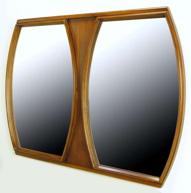 Walnut framed double mirror with barrel shaped mirrored glass inserts. Perfect for a double vanity sink.