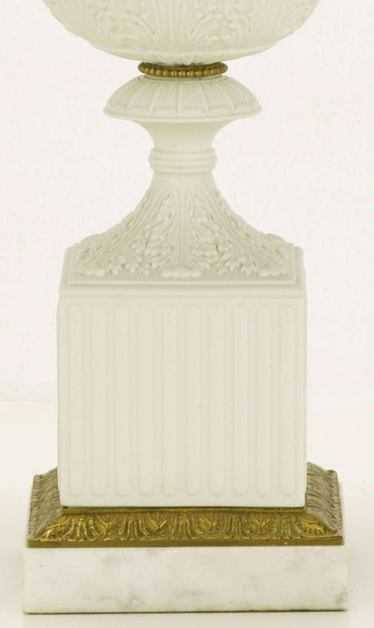 Mid-20th Century Pair Neoclassical White Bisque Porcelain Urn Form Table Lamps