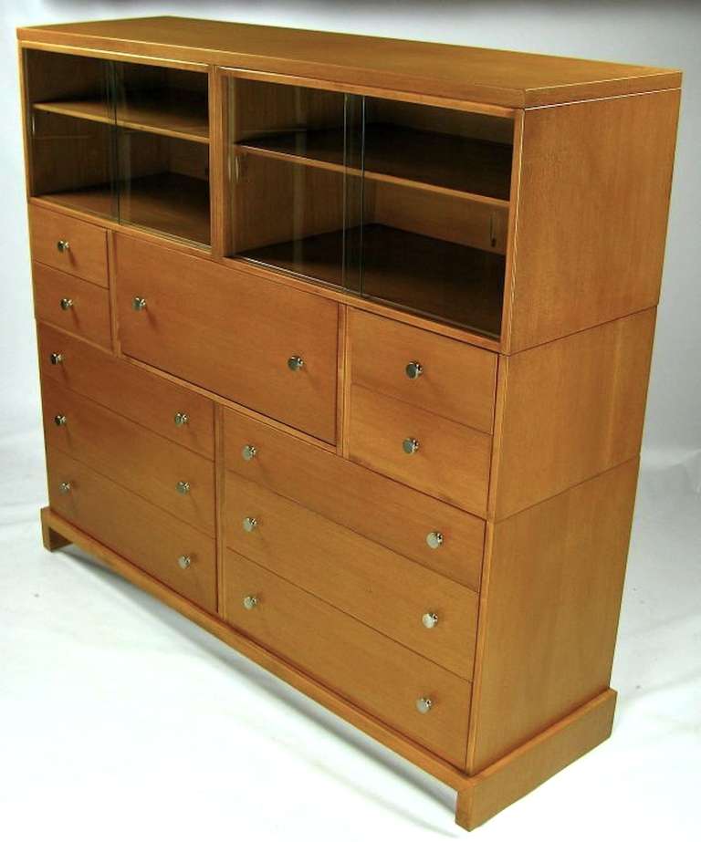 Predating T.H. Robsjohn-Gibbings' work for Widdicomb, this most useful secretary was designed by C.g. Kimerly, as part of Widdicomb's Flexi-Unit collection. 
Constructed of mahogany, it is finished in 