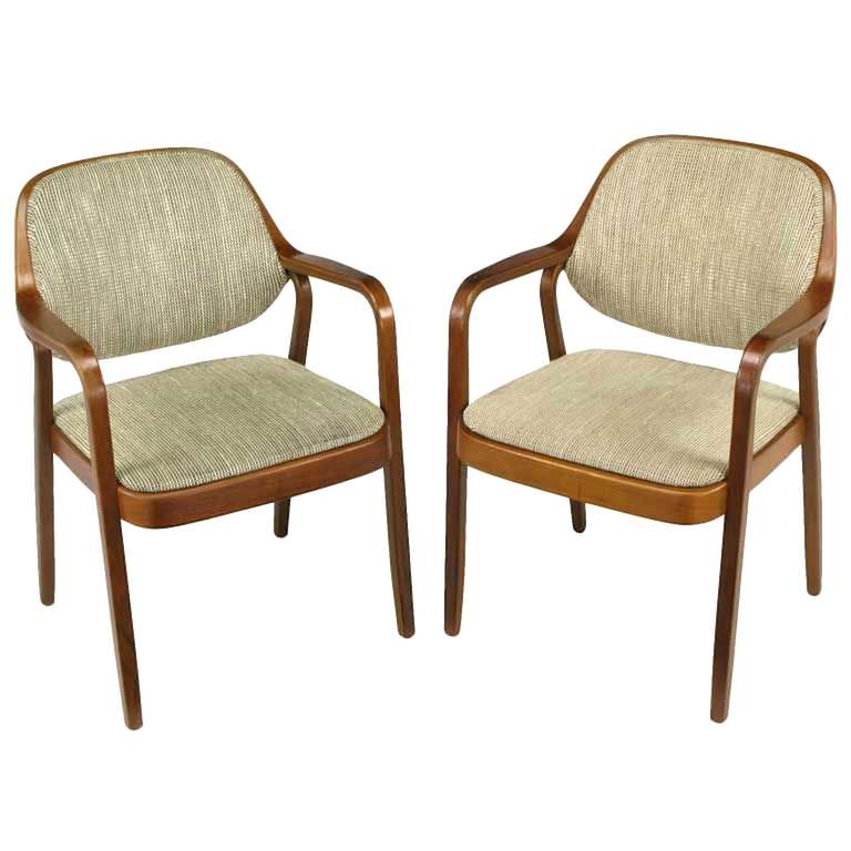 Pair of bentwood armchairs by Don Pettit for Knoll. Two lengths of pressed and bent layers of sculpted wood make up the legs and arms as well as the seat back frame. The only other exposed and finished wood is the seat apron. Original Knoll