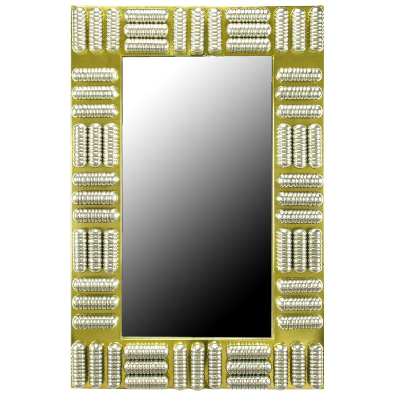 Miroir mural personnalisé en laiton et aluminium filé à la manière de C. Jere, vers 1970