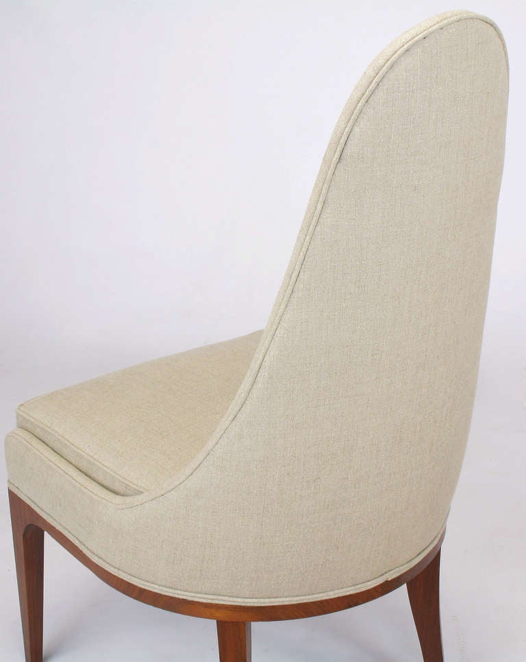 Mid-20th Century Set of Four Rosewood and Linen Spoon-Back Dining Chairs For Sale