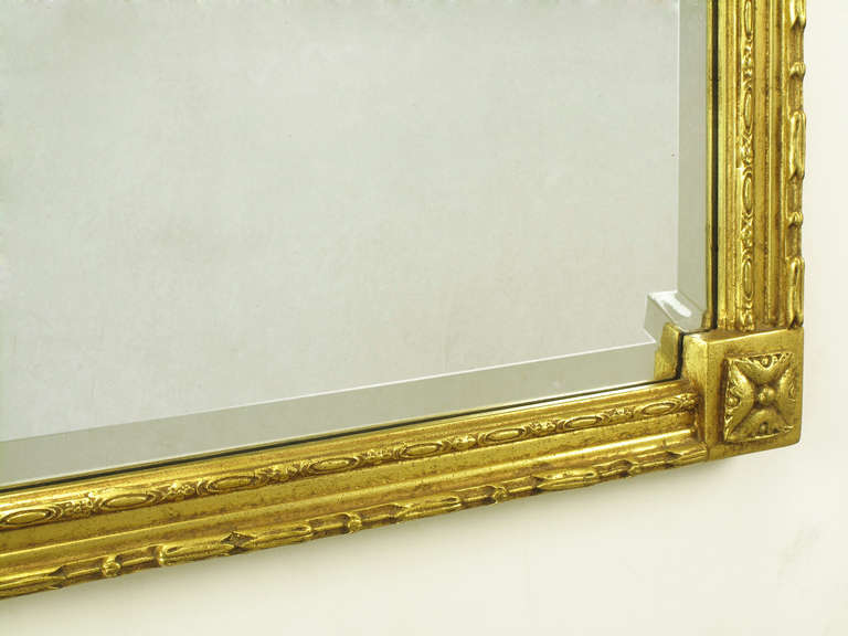 Carved Pair of Giltwood and Gesso in Louis XVI Style Beveled Mirrors