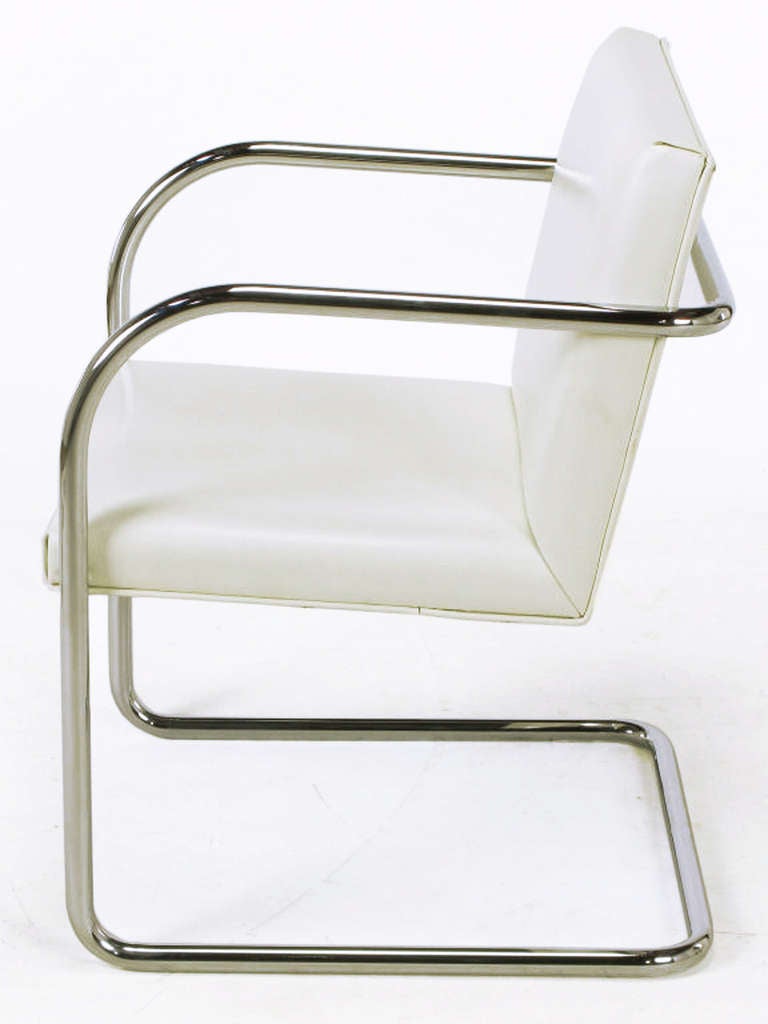 white cantilever dining chairs