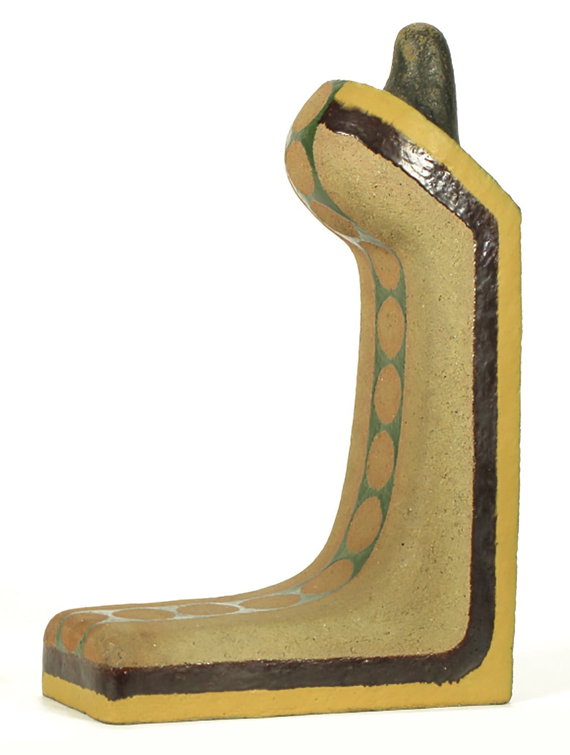 Abstract ceramic sculpture in parcel glazed finish of brown and yellow border with center dotted open green band. Reverse side features an organic top element that is glazed dark green. 

From the estate of William August Hoffman, a professor of