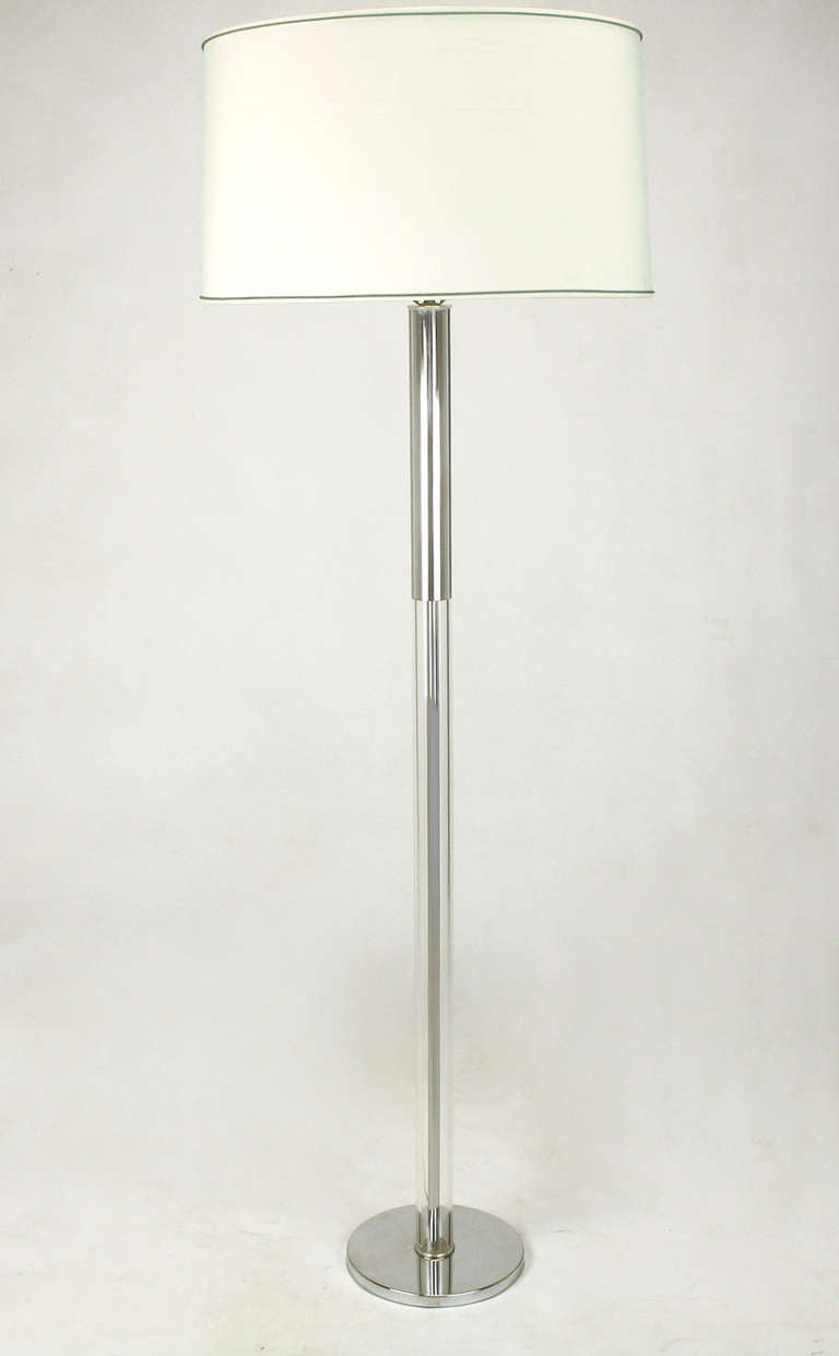 Sleek floor lamp in chromed steel and Lucite in the manner of Walter Von Nessen. 9.5