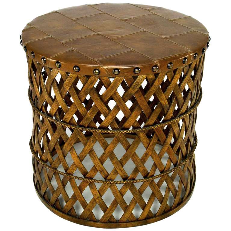 Henredon dining table constructed of woven wood and patchwork leather with large brass stud upholstery nails. Versatile Caribbean Island influenced table that could be used as a centre table or end table, as well as a breakfast or kitchen table.