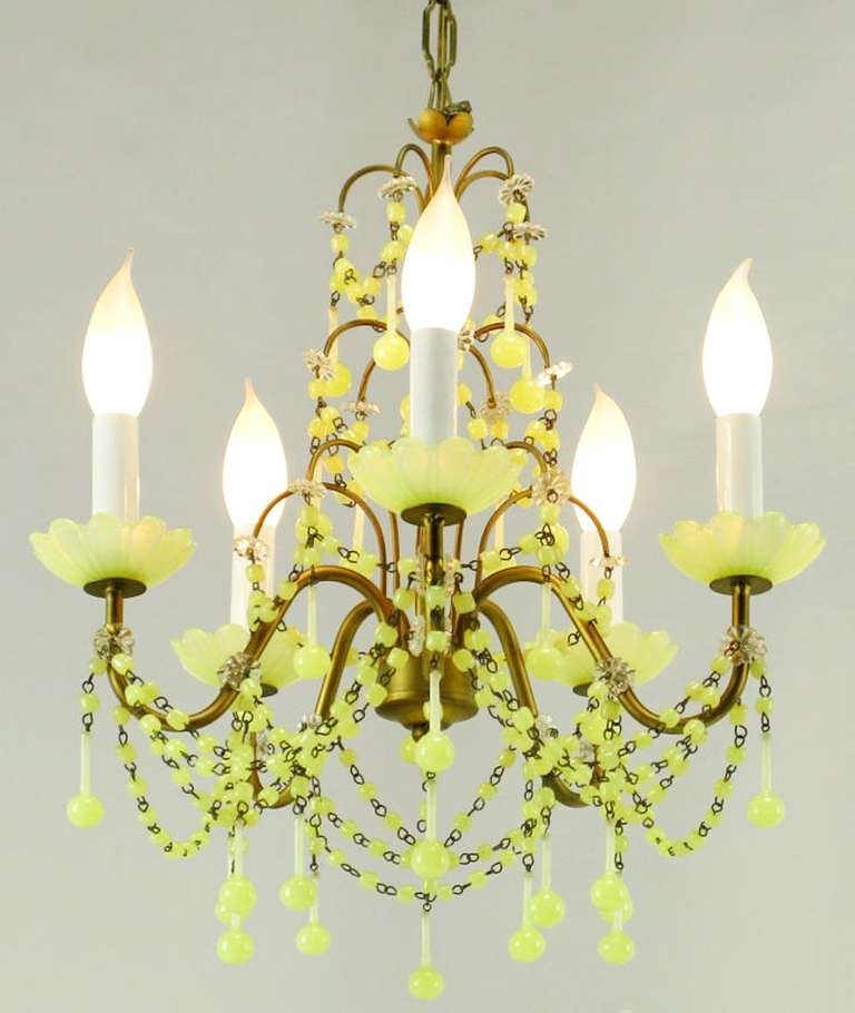 Rare and exquisite chartreuse green opalescent glass adorns this five-arm brass chandelier from Italy. It also features opalescent glass beads swagged throughout. Perfect for a small elegant dining area or powder room.