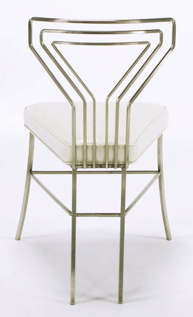Six Geometric Back Dining Chairs in Polished Steel 1