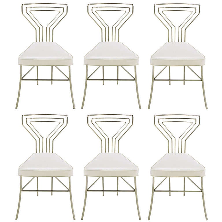 Six Geometric Back Dining Chairs in Polished Steel