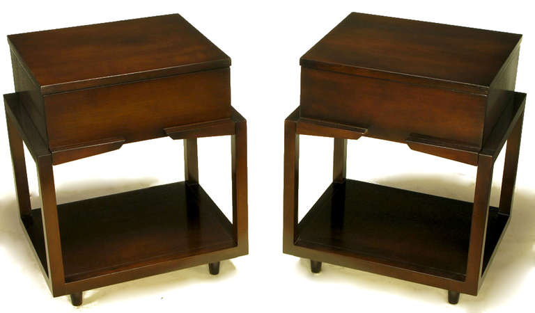Pair of uncommon dark birch nightstands or end tables with open bases and single drawers from Albert Modern of Shelbyville Indiana. Each drawer has a pair of carved wood geometric pulls that appear to be part of the frame but in actuality function