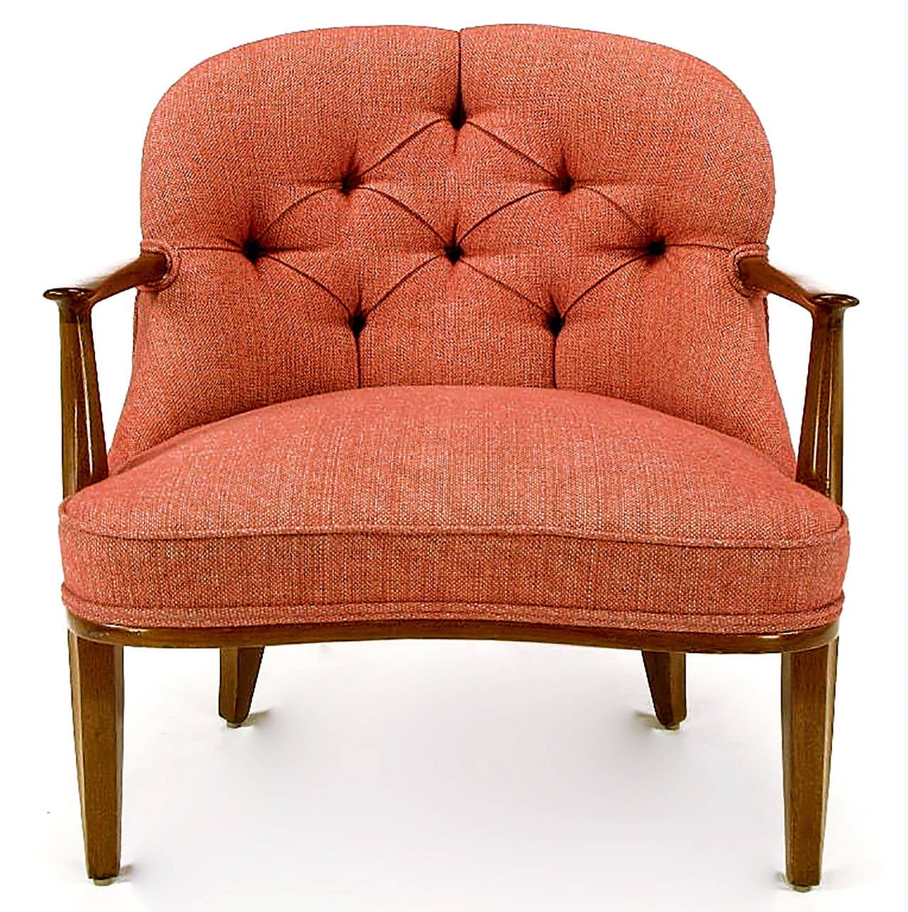 Pair of Edward Wormley for Dunbar Janus collection armchairs. Carved walnut arms and legs with exposed frame. Raspberry red linen upholstery with a button tufted back with curved and radius seat corner.