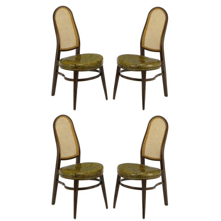 Four Edward Wormley Chairs of Bent Mahogany, Cane, and Leather