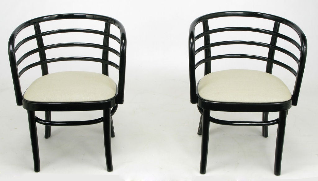 Kohn-Mundus bentwood Vienna Secession style barrel chairs, in the manner of Otto Wagner, and perhaps even a Wagner design.  In black lacquer, with new off white linen upholstered seats. <br />
<br />
Kohn-Mundus was formed in 1914 with the merger