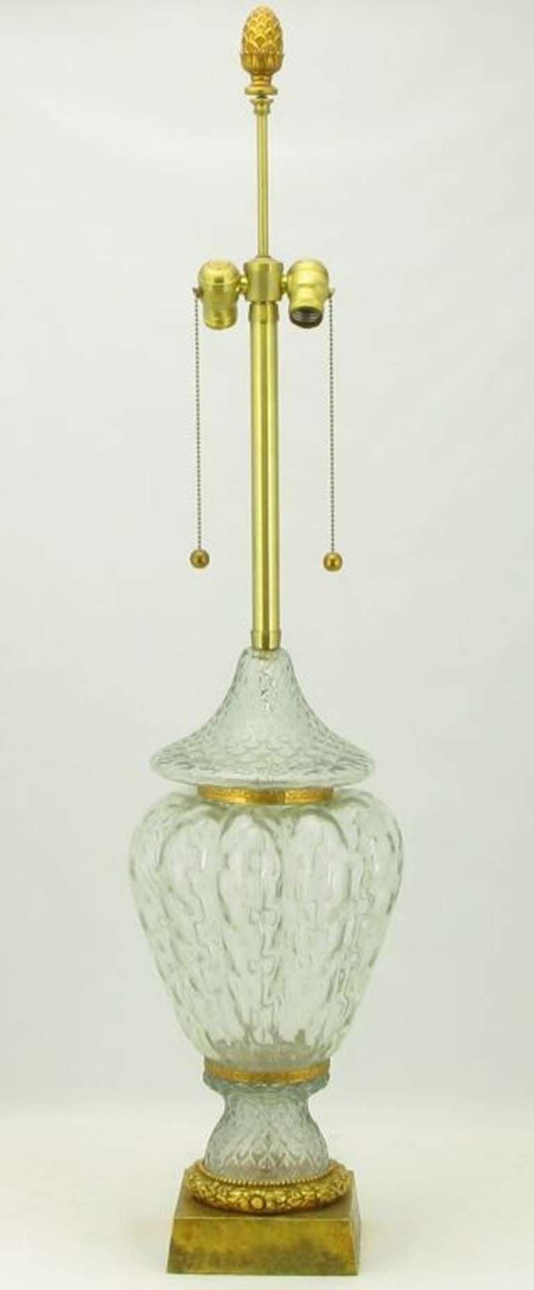 Large Regency style crystal vase table lamp from fine American lamp maker, Marbro. Base is a gilt metal plinth with a brass ring with foliate detail. The Marbro signature double socket with brass ball and chain pulls are featured. Sold sans shade.