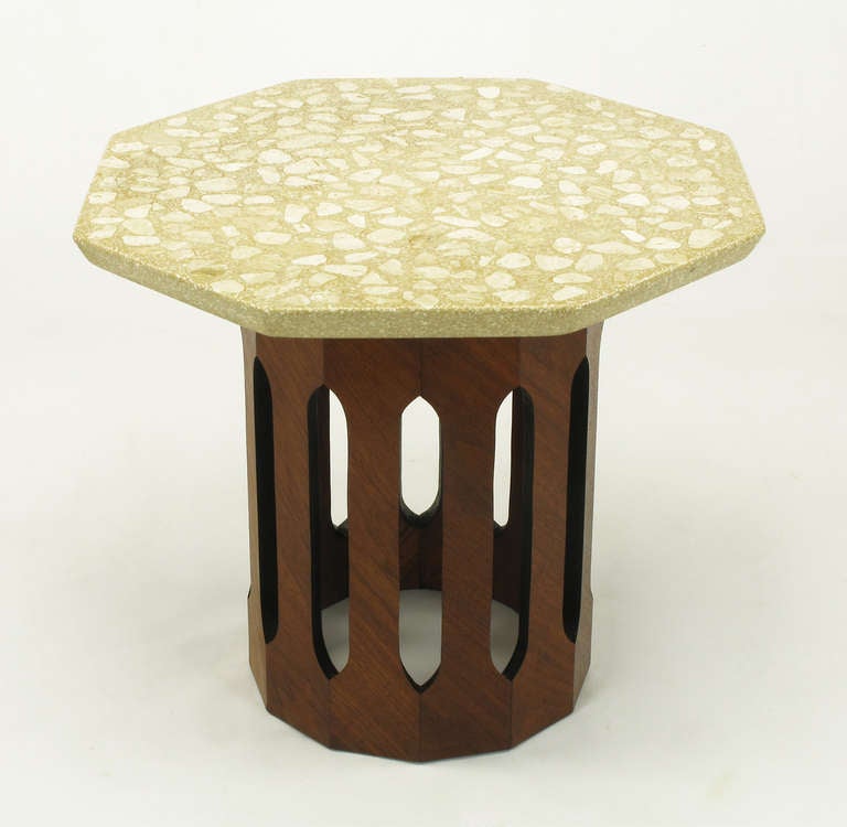 Harvey Probber side table with mahogany veneered dodecagon open base. Twelve sided mahogany veneered pedestal has twelve pointed oval openings that have black lacquer finished edging. Octagonal terrazzo marble top is a fawn and white color with a