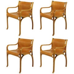 Vintage Four Faux Bentwood Resin and Umber Leather Arm Chairs