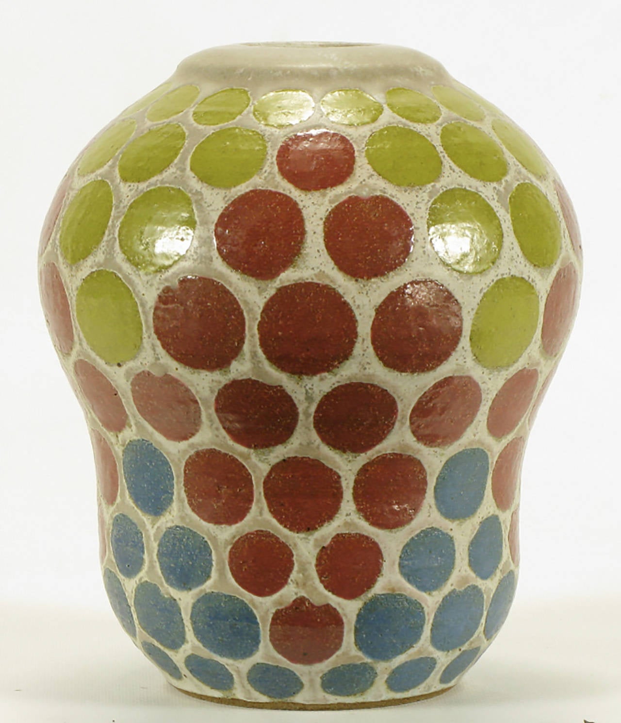 Inverted pear shaped ceramic vase with patterned polka dots by Tomiya Matsuda (1939-2011). Small circular top opening and background of off-white earthen glaze. Patterned circles in umber, cerulean blue and olive.

Until 1948, Japanese ceramic