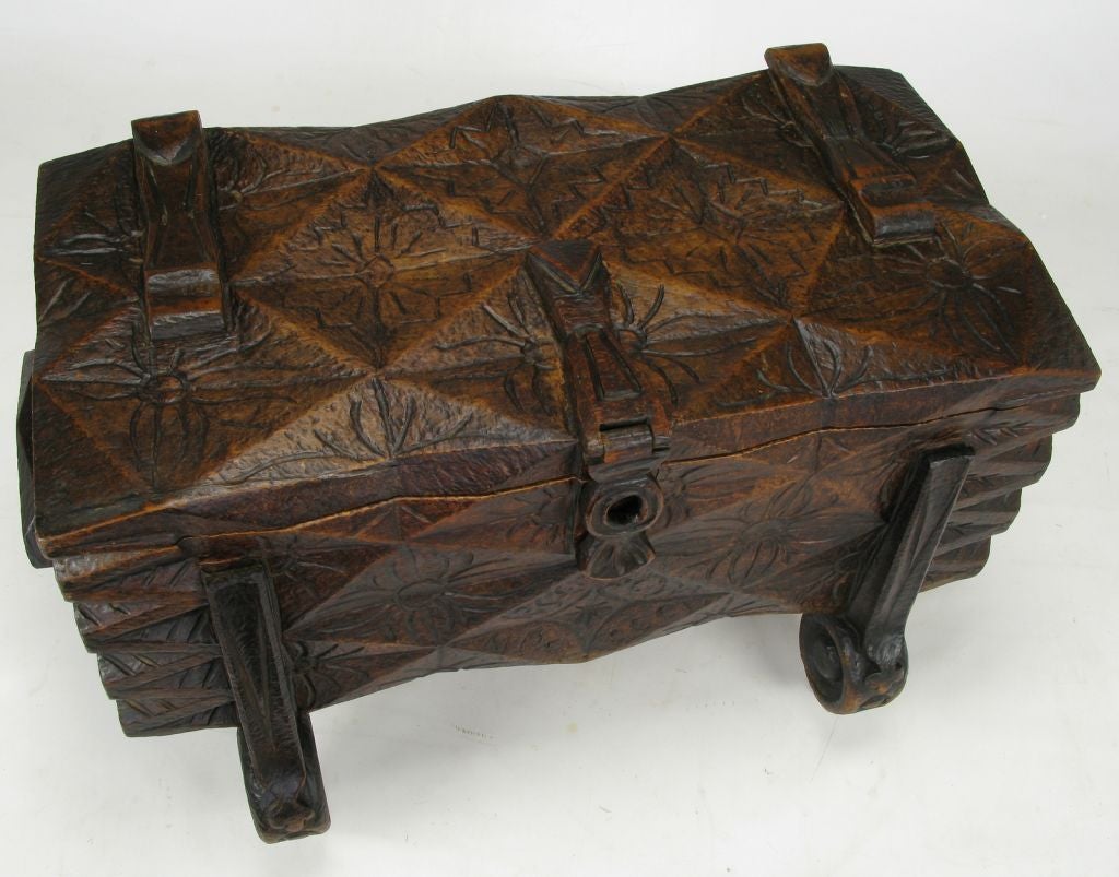 Large Heavily Carved Spanish Latched Trunk On Legs at 1stDibs