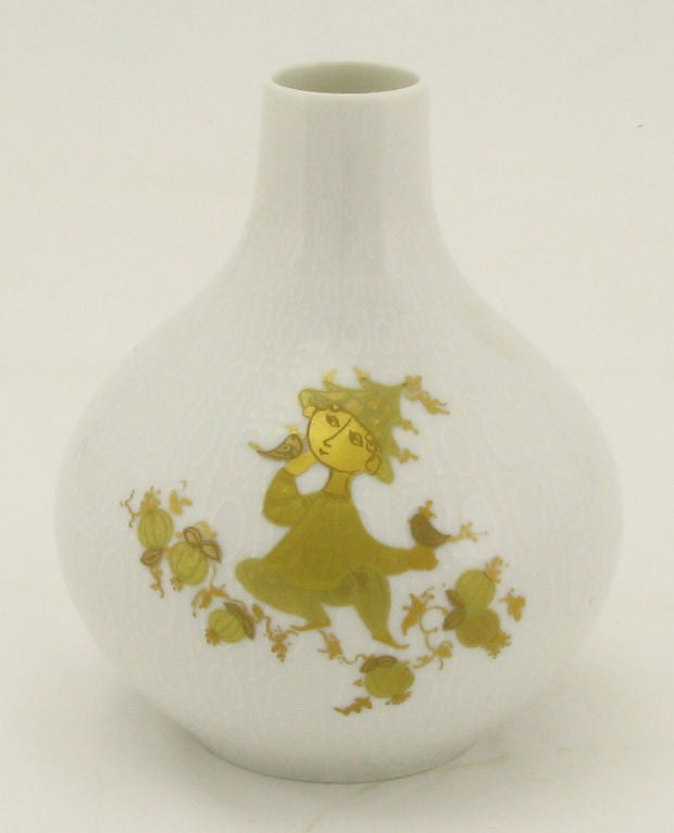 Bjorn Wiinblad for Rosenthal China gourd form vase with studded and oval relief. Hand painted in gold leaf, is a playful character prancing among the pumpkins; a childlike design typical of Wiinblad's artistry.