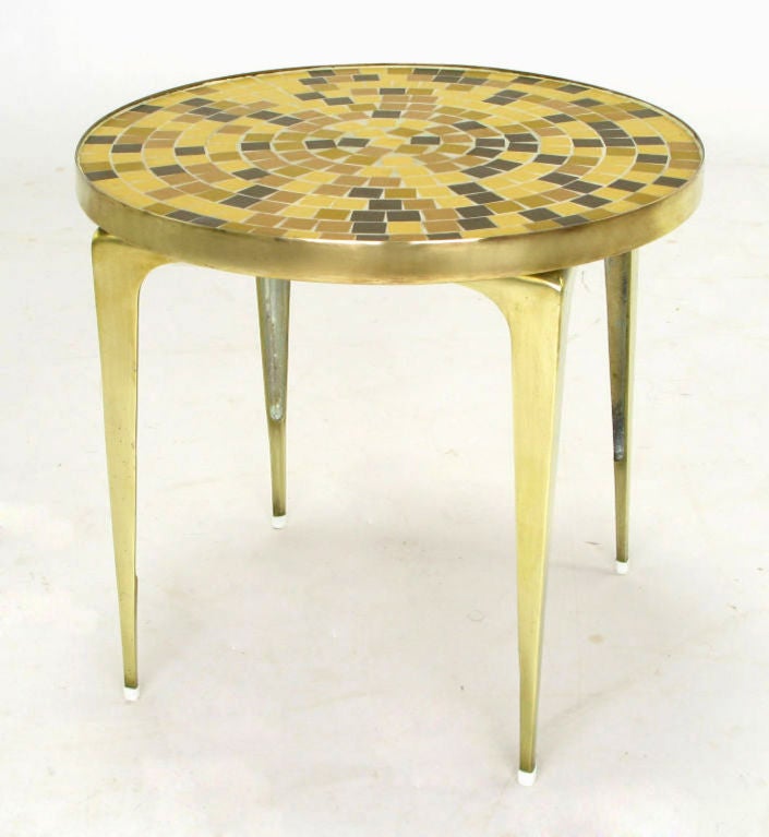 Round Japanese brass side table with mosaic tile inlay. The tile has a matte glaze and is in earthen tones of saffron yellow, terracotta red, cafe au lait brown, and dark chocolate brown.