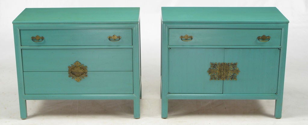 Pair of Tiffany blue lacquered commodes/cabinets by Century Furniture. Each cabinet is slightly different with one having three drawers and the other having one drawer and two doors that open to reveal a storage cabinet. Brass chinoiserie drop pulls