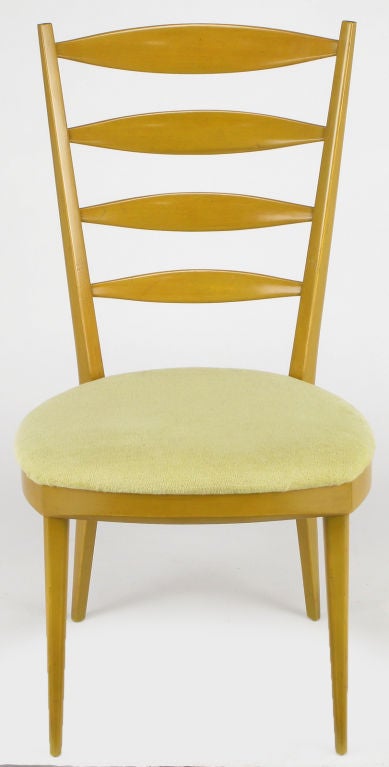 Champagne birch wood with a chartreuse velvet seat and stylized ladder back desk chair, by Heywood-Wakefield. Possibly a John Van Koert design.