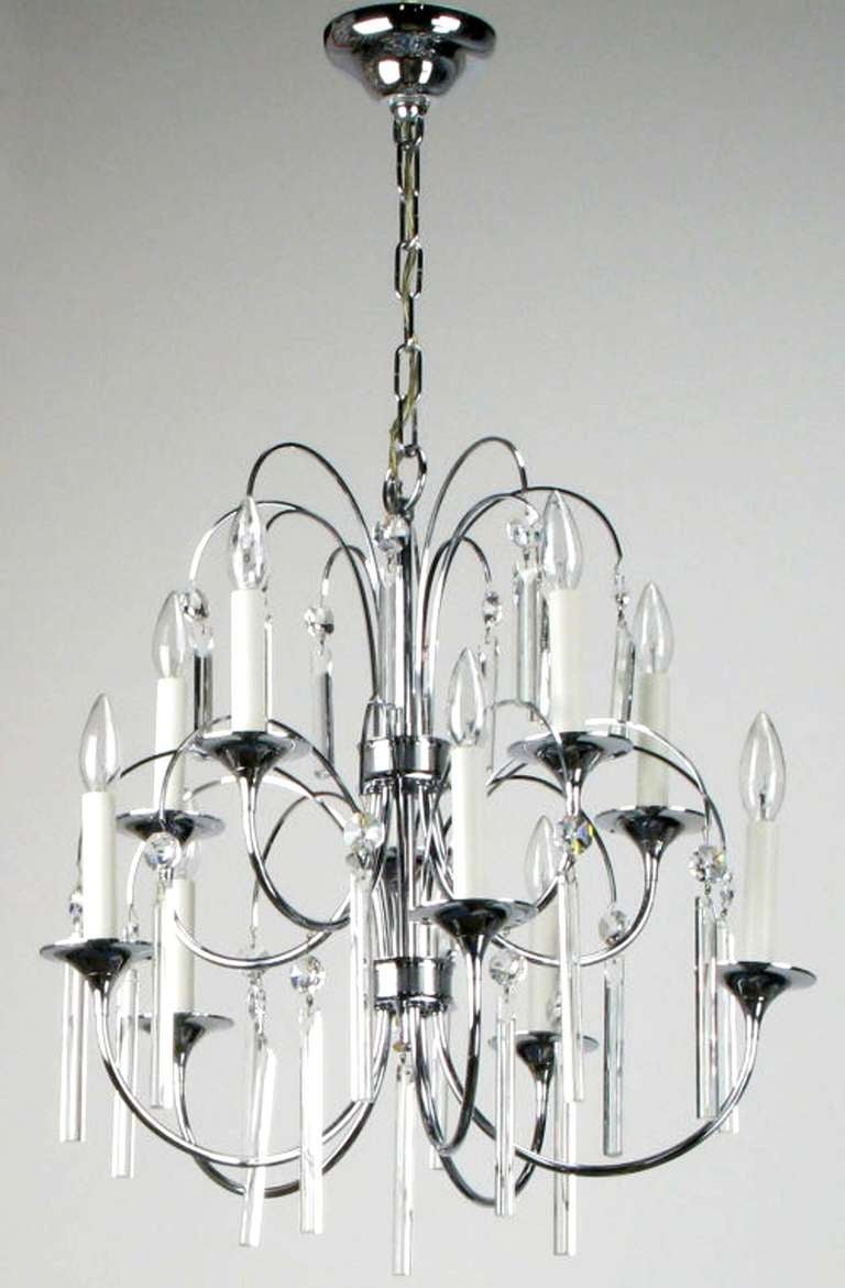 Beautiful chrome over brass ten arm Italian chandelier with trumpet bobeches and long square rod crystals with angled tops. The look evokes an illuminated fountain.
