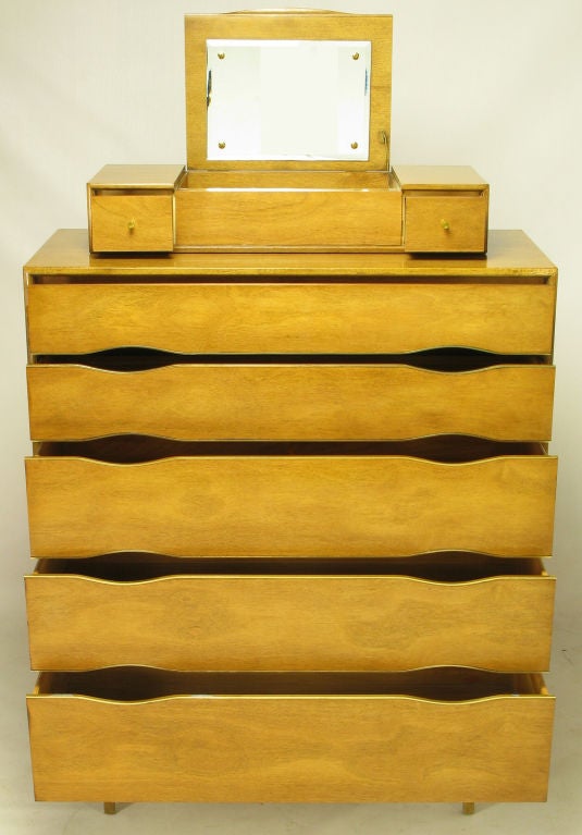 Tall five drawer commode from Vignola Furniture, Chicago,Il. Bleached walnut case and drawer fronts, brass edging and black lacquered 