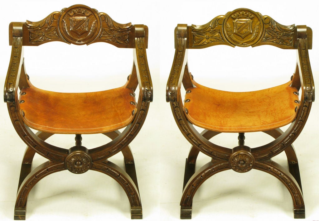 American Pair Carved Oak & Umber Leather Curule Base Arm Chairs
