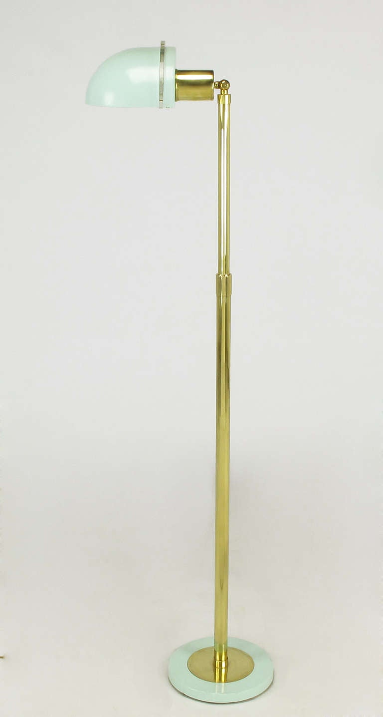 Art deco revival pharmacy style floor lamp with robin's egg blue enameled quarter sphere articulated steel shade with acrylic banding detail. Brass stem is adjustable from a minimun height of 44