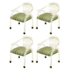 Four Sculptural Bent Lucite And Upholstered Arm Chairs