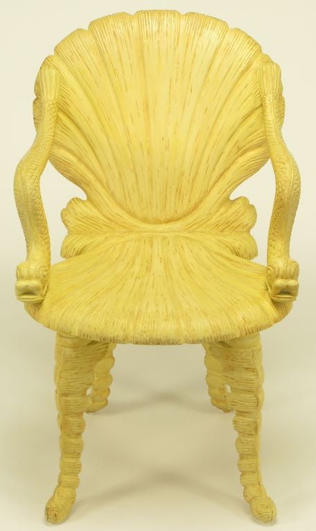 Maitland Smith recreation of a classic Italian 19th C carved wood and lacquer, shell form Italian grotto chair with dolphin arms.