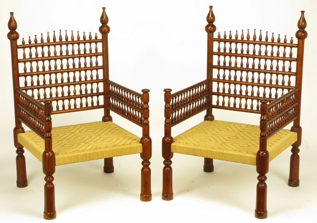 Beautiful carved teak wood and woven patterned rush seat arm or throne chairs with Moroccan styling. Also available with seat and back cushions.