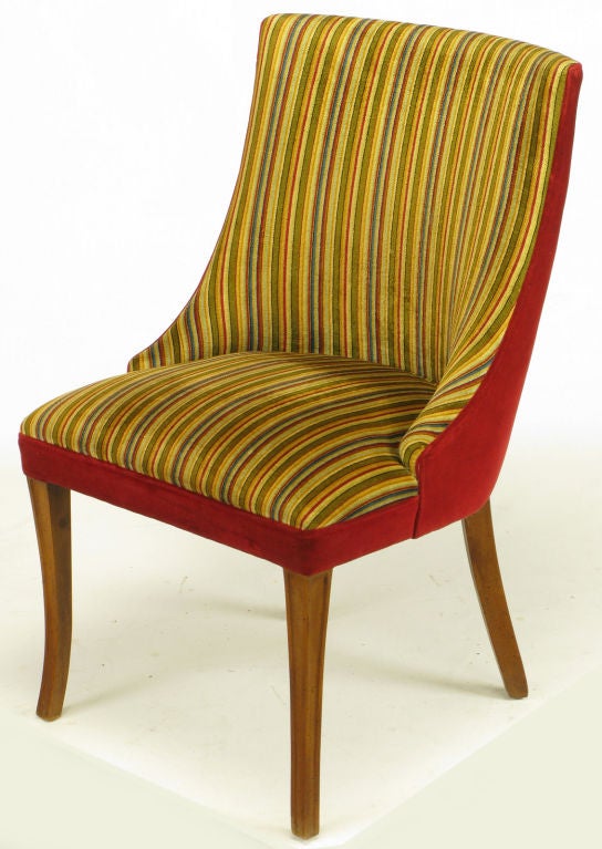 Barrel back velvet upholstered regency slipper or desk chair. Striped velvet seat and back in gold, sage, blue, orange and red with a solid red velvet barrel back and apron. Legs are walnut with the front legs having reveal detail. Would make an