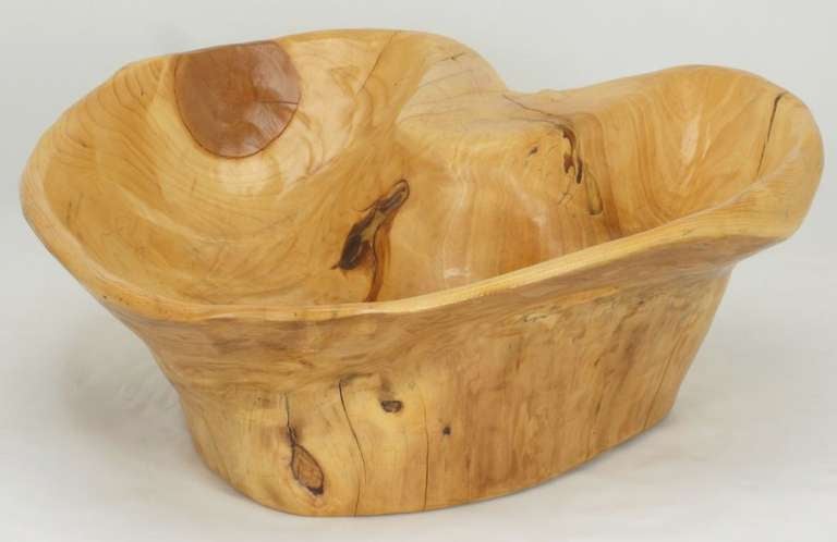 Beautifully caved and finished burled wood root bowl or vessel. Live edge and shape, a unique and functional artistic center piece.