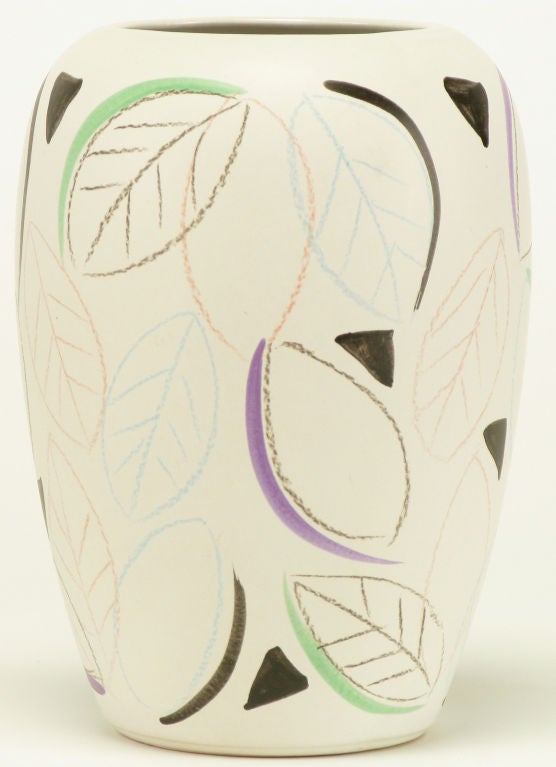 Slip mold ceramic pottery vase, by Heinz Siery for Scheurich Keramic W. Germany. Adorned with hand painted leaves that have a wax pencil quality, and geometric shapes.  Low luster finish resembles gesso.