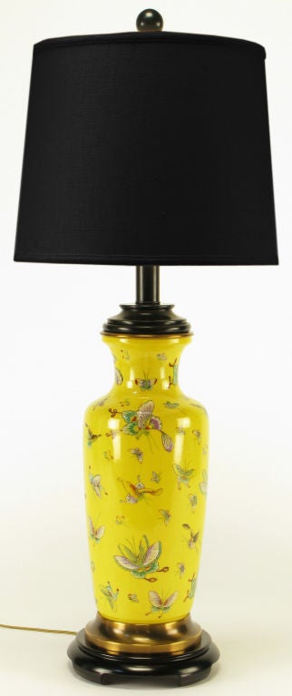 Paul Hanson Lighting saffron yellow glazed Chinoiserie vase form table lamp with transferware style butterflies. Black lacquered wood base, wood cap and metal stem with brass spacers. Sold sans shade.