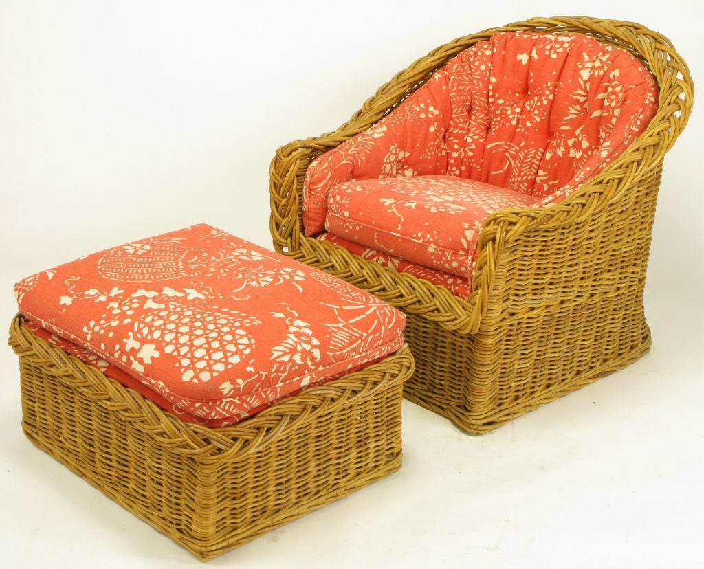 Woven and braided Italian rattan barrel back lounge chair and matching ottoman from The Wicker Works San Francisco CA. Upholstered in the original button tufted coral and white printed linen. Ottoman Dimensions 16