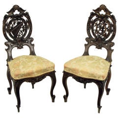 Pair Early 1900s Hand Carved Walnut French Regency Music Chairs