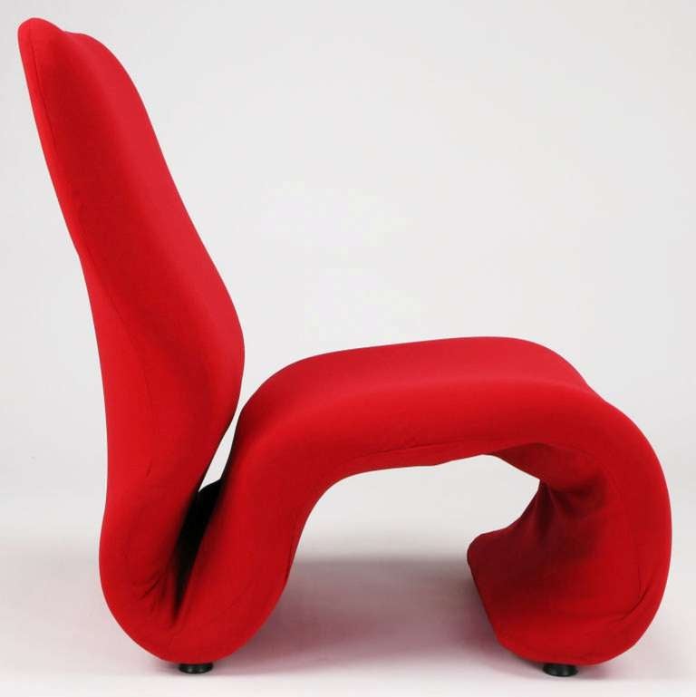 Swedish modern red wool upholstered bent plywood chair in the style of the work by Verner Panton for Storz and Palmer. One piece bent plywood frame designed to conform to the body's natural curvature. Covered in the original foam and fabric.