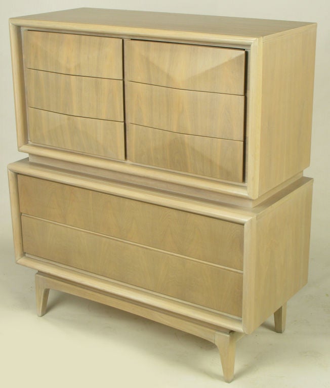 Bleached and white glazed walnut tall chest, with double pyramidal top section and double drawer bottom section. Six drawer upper chest is designed with a double pyramid front and the lower chest features two full width drawers. Mounted on a
