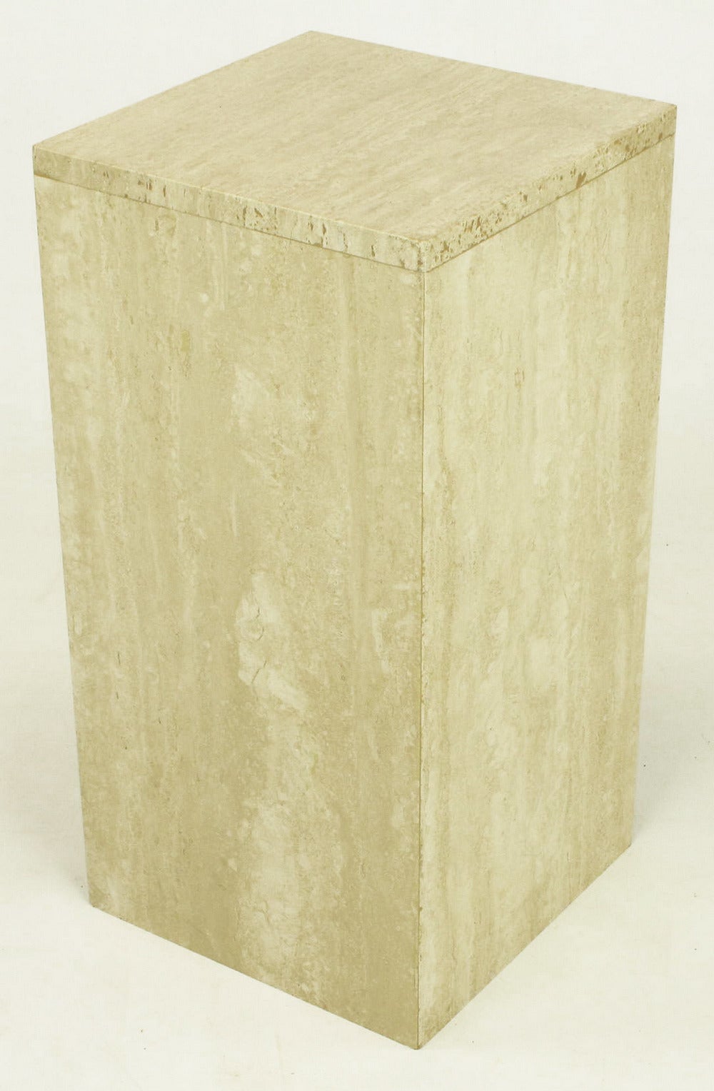 Beautifully veined travertine pedestal side tables. Versatile pair can be used as pedestals, tables or with a piece of glass bridging the two, a console table.
